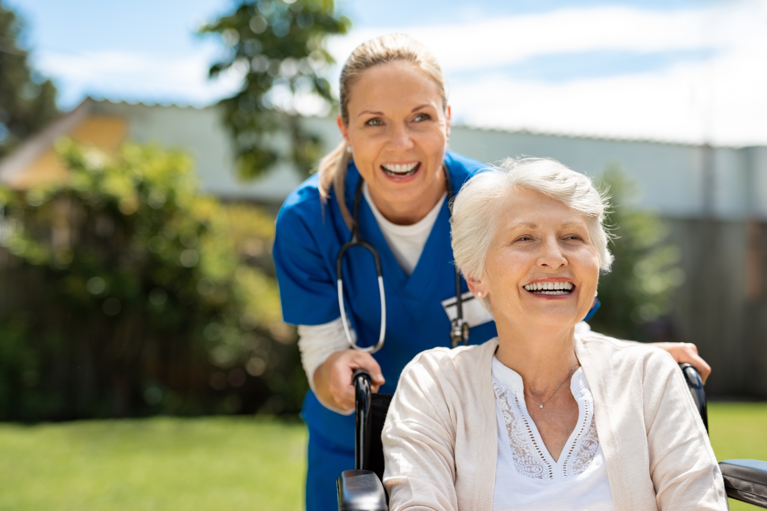 2 woman laughing