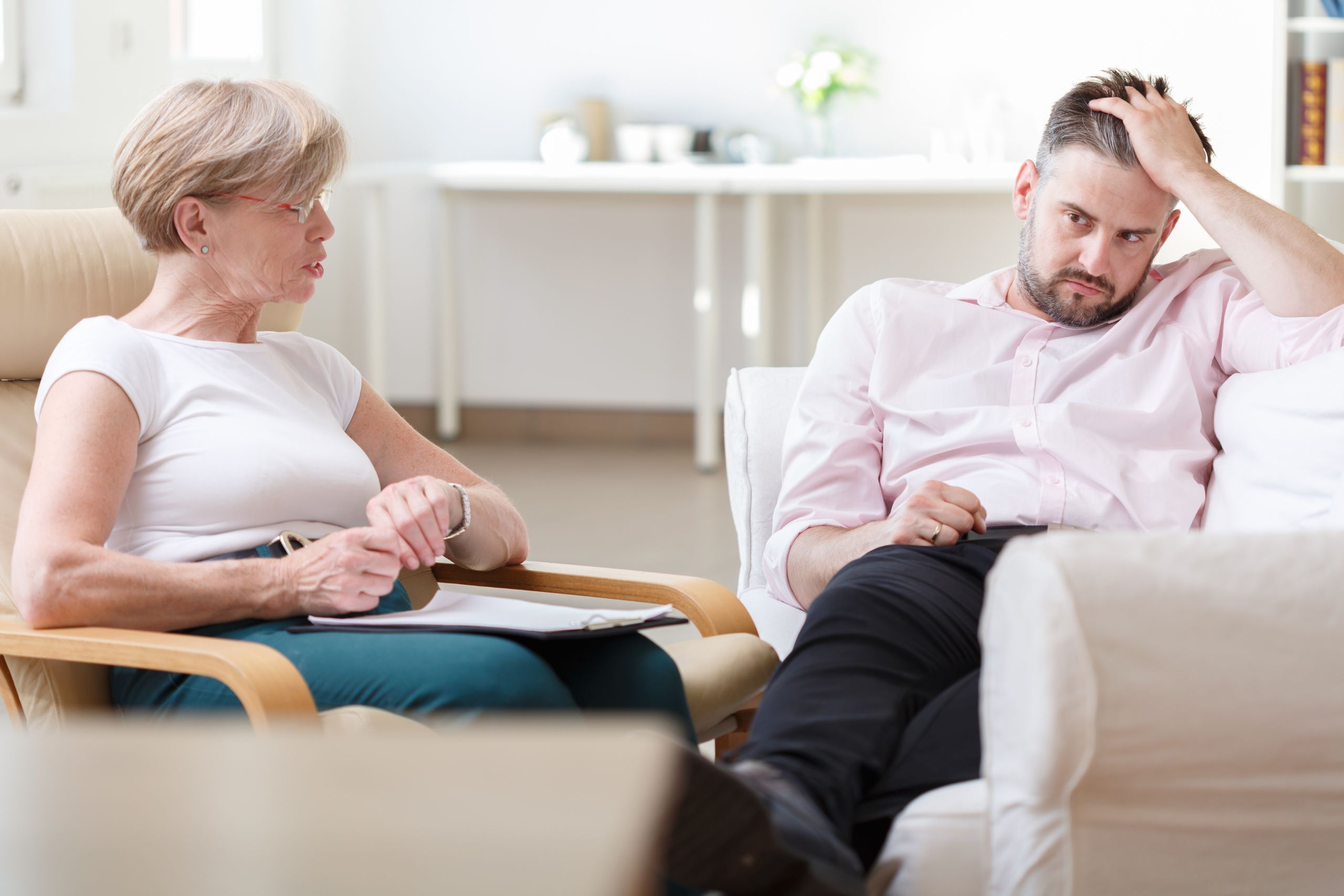 man and woman talking